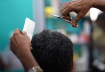 మంత్రికి కటింగ్ చేసి 60వేల రూపాయలు నొక్కేశాడు..